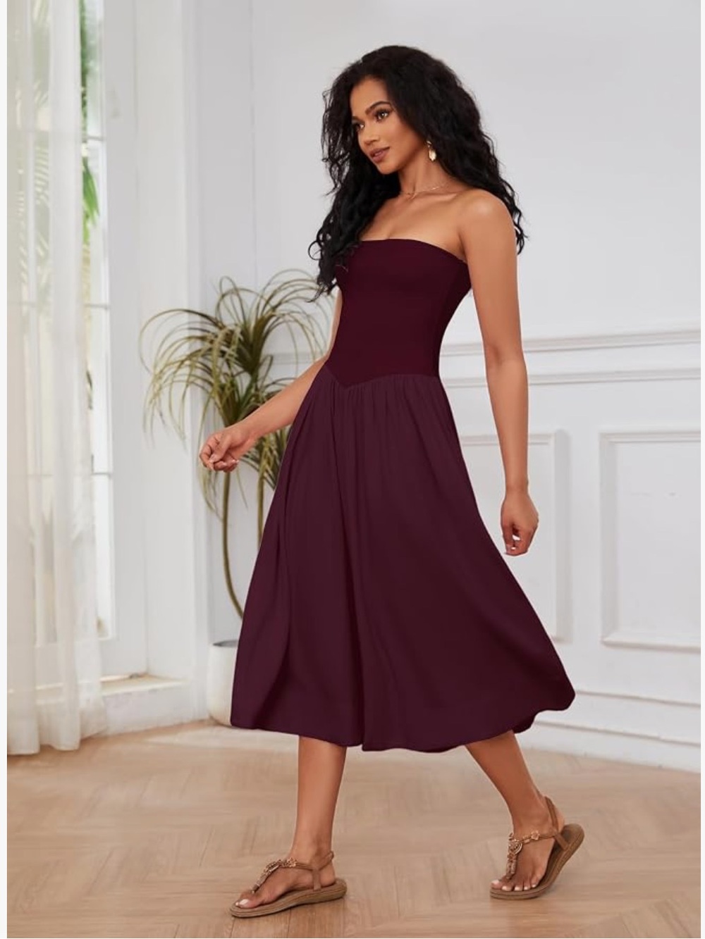 Women's strapless maroon midi dress.